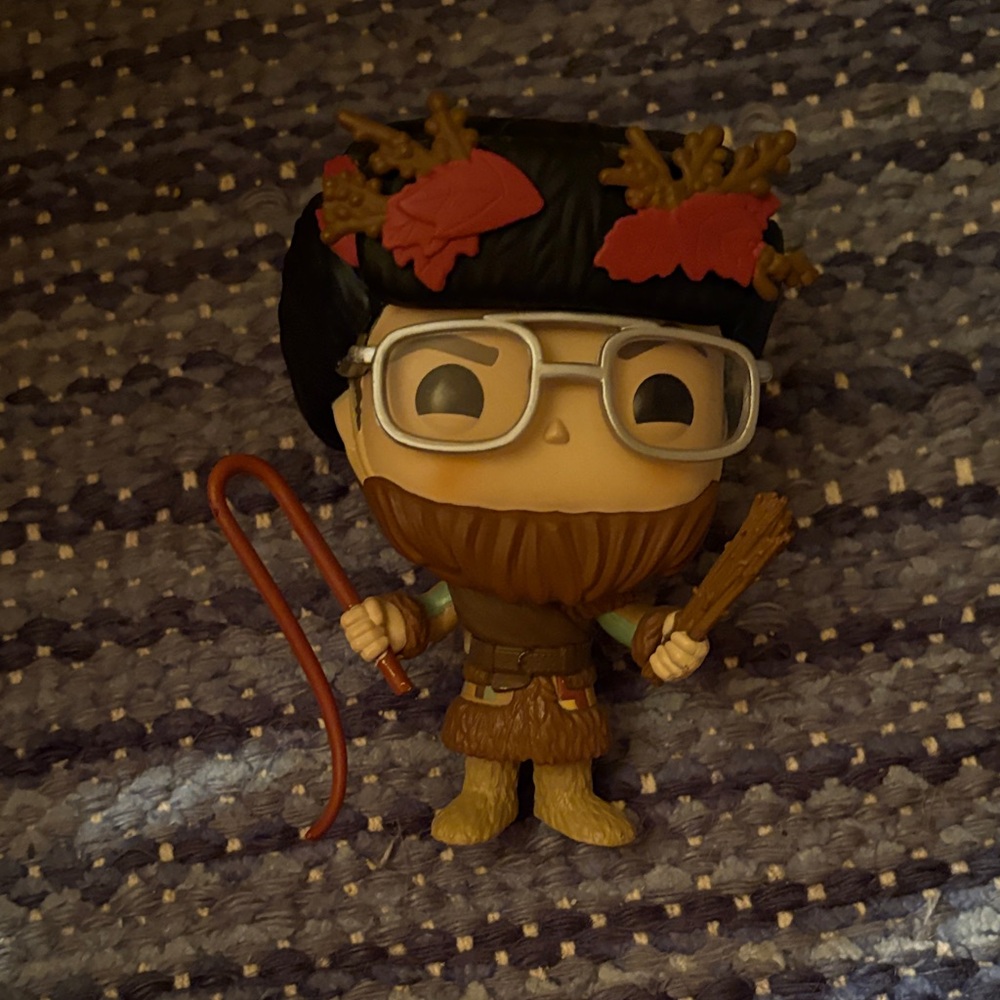 Funko Pop Figure with Red Leaves and Glasses